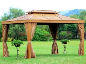 Tonnelle 3 x 4 m effet bois avec cadre aluminium et toit en acier